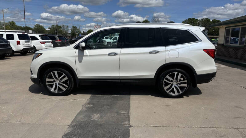 Used 2017 Honda Pilot Touring with VIN 5FNYF6H95HB040322 for sale in Mcpherson, KS
