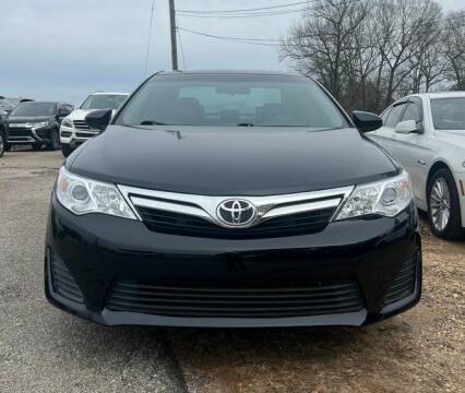 2014 Toyota Camry for sale at Dixie Motors Inc. in Northport AL