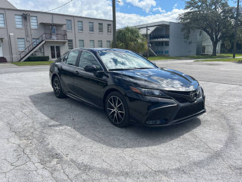 2021 Toyota Camry for sale at Tampa Trucks in Tampa FL