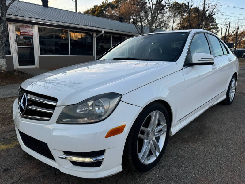 2014 Mercedes-Benz C-Class for sale at Mandingo's Automotive & Sales LLC in Snellville GA