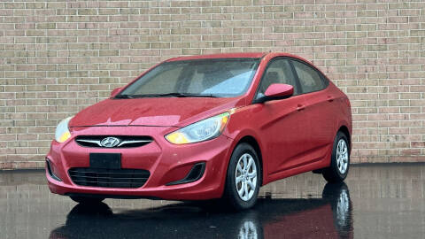 2014 Hyundai Accent for sale at AMERICAR INC in Laurel MD