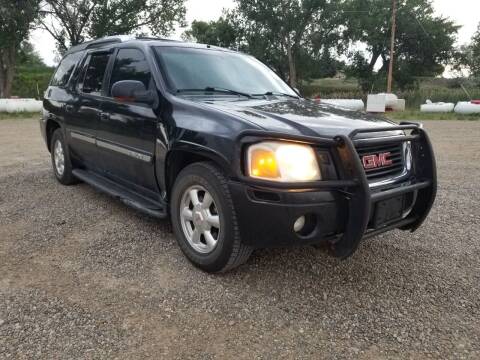 2004 GMC Envoy XUV for sale at KHAN'S AUTO LLC in Worland WY