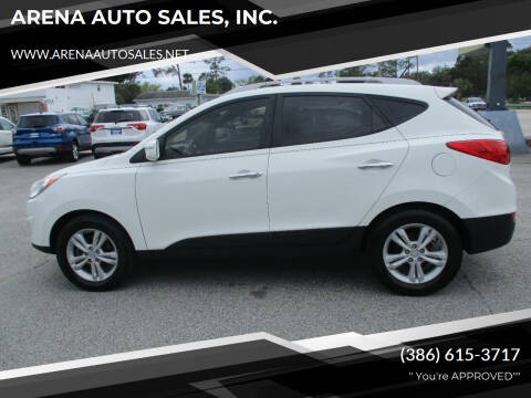 2012 Hyundai Tucson for sale at ARENA AUTO SALES,  INC. in Holly Hill FL