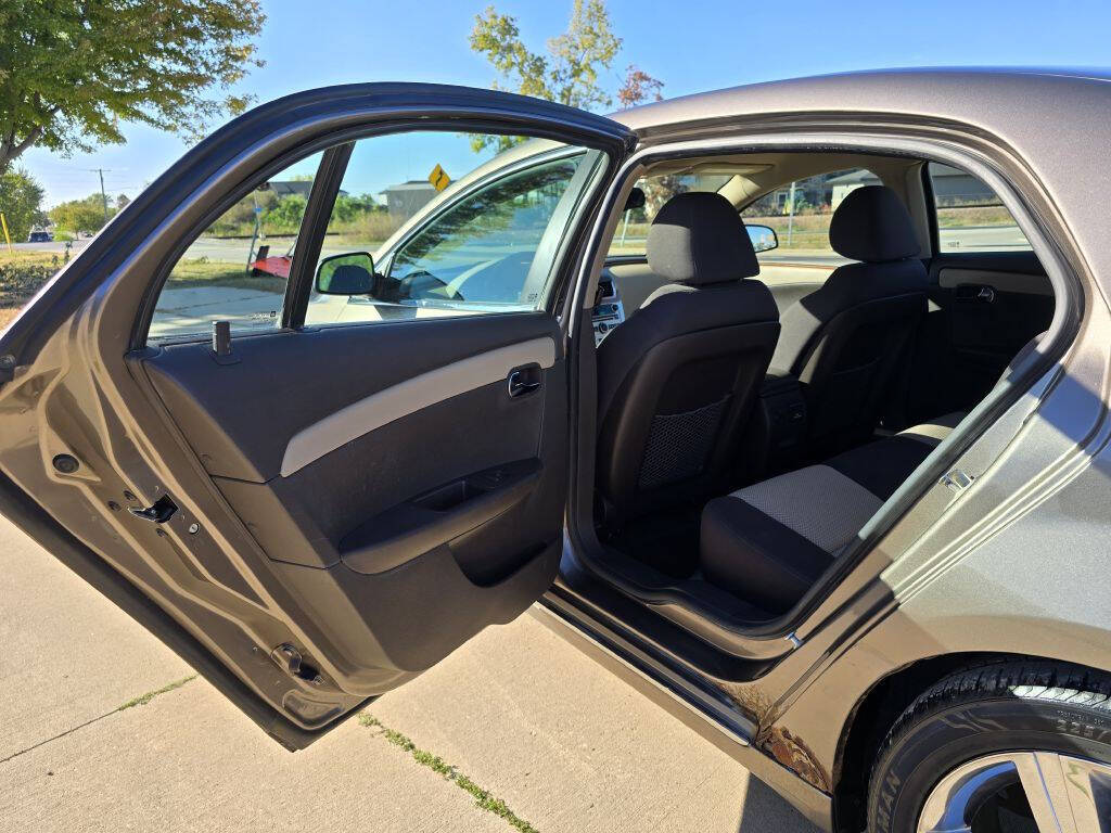 2012 Chevrolet Malibu for sale at Bigfoot Auto in Hiawatha, IA