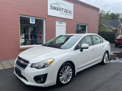 2014 Subaru Impreza for sale at SMART DEAL AUTO SALES INC in Graham NC