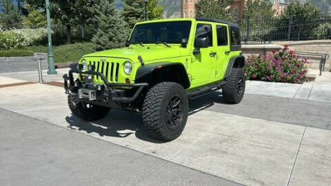 2012 Jeep Wrangler for sale at Classic Car Deals in Cadillac MI