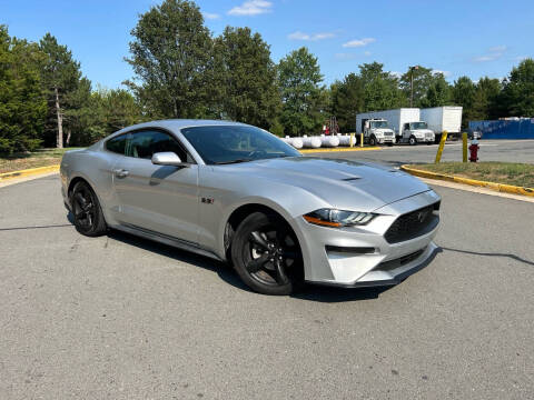 2018 Ford Mustang for sale at BOOST MOTORS LLC in Sterling VA