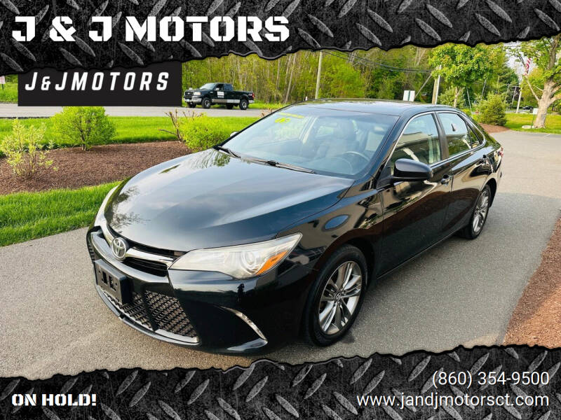 2015 Toyota Camry for sale at J & J MOTORS in New Milford CT