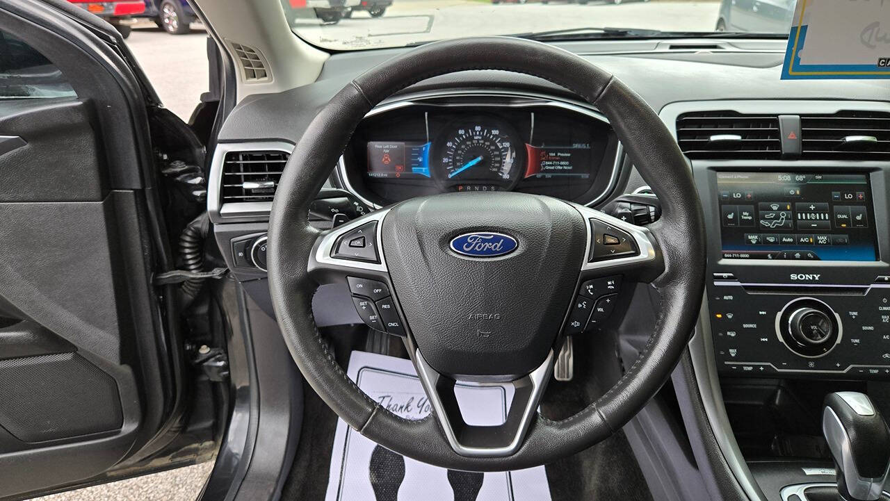 2014 Ford Fusion for sale at North Ridge Auto Center LLC in Madison, OH