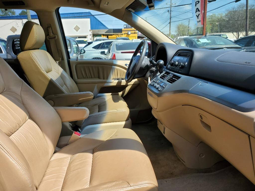 2010 Honda Odyssey for sale at DAGO'S AUTO SALES LLC in Dalton, GA