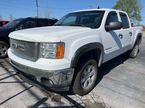 2012 GMC Sierra 1500 for sale at HEDGES USED CARS in Carleton MI