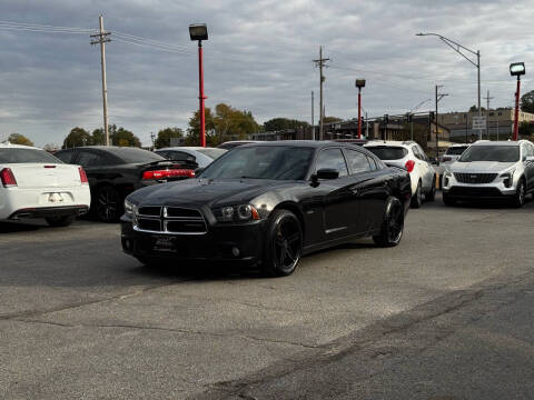 2014 Dodge Charger for sale at El Chapin Auto Sales, LLC. in Omaha NE