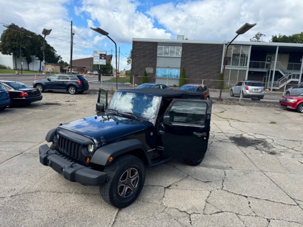 2011 Jeep Wrangler for sale at First Class Auto Mall in Akron, OH