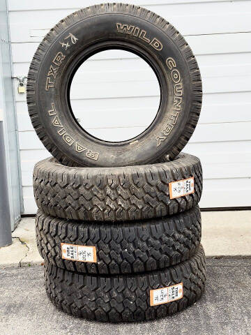  Wild Country Radial TXR LT225/75R16 Studded Snow Tires for sale at Atlas Automotive Sales in Hayden ID