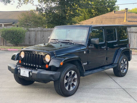 2012 Jeep Wrangler Unlimited for sale at KM Motors LLC in Houston TX