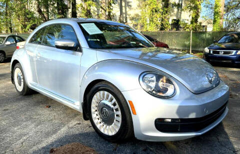 2013 Volkswagen Beetle for sale at DK Auto LLC in Stone Mountain GA