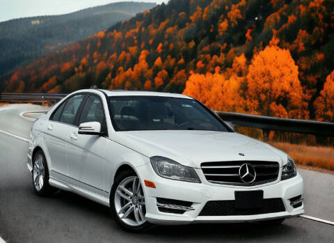 2014 Mercedes-Benz C-Class for sale at Atlanta Unique Auto Sales in Norcross GA