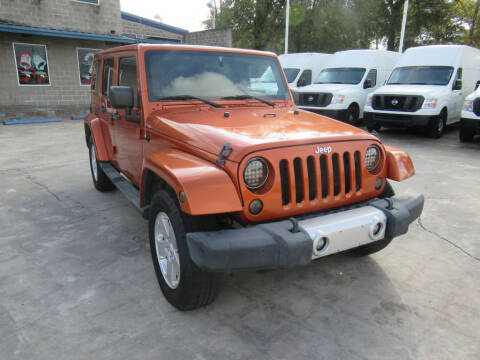 2011 Jeep Wrangler Unlimited for sale at Lone Star Auto Center in Spring TX