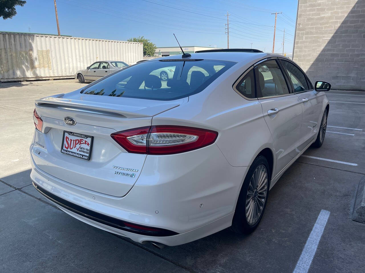 2014 Ford Fusion Hybrid for sale at Super Auto Sales Modesto in Modesto, CA