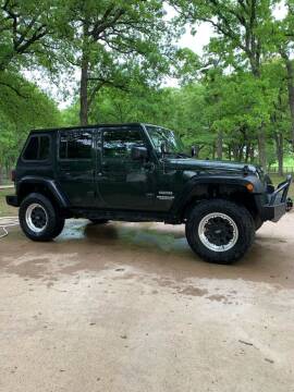 2011 Jeep Wrangler Unlimited for sale at BARROW MOTORS in Campbell TX