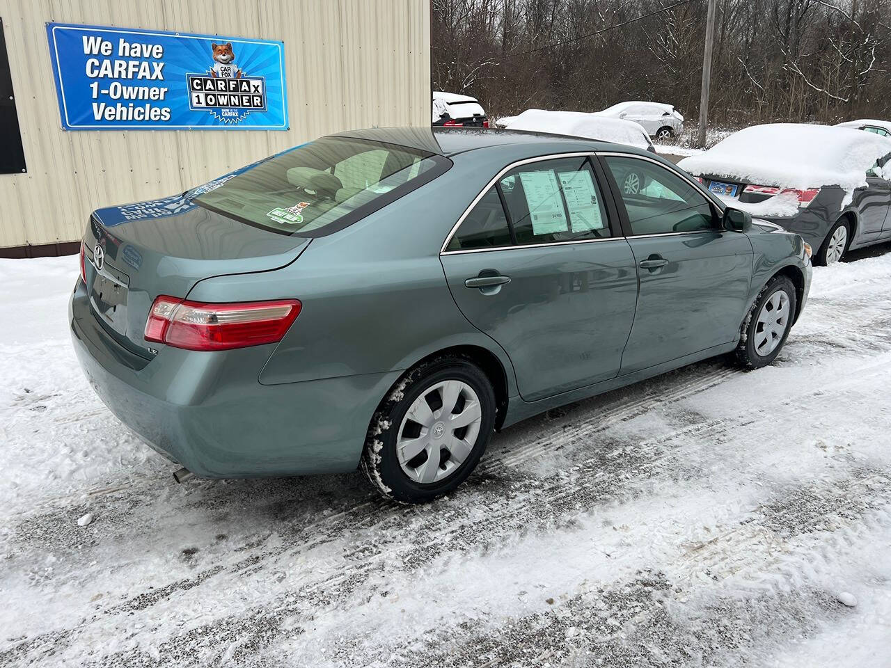 2009 Toyota Camry for sale at BNM AUTO GROUP in GIRARD, OH