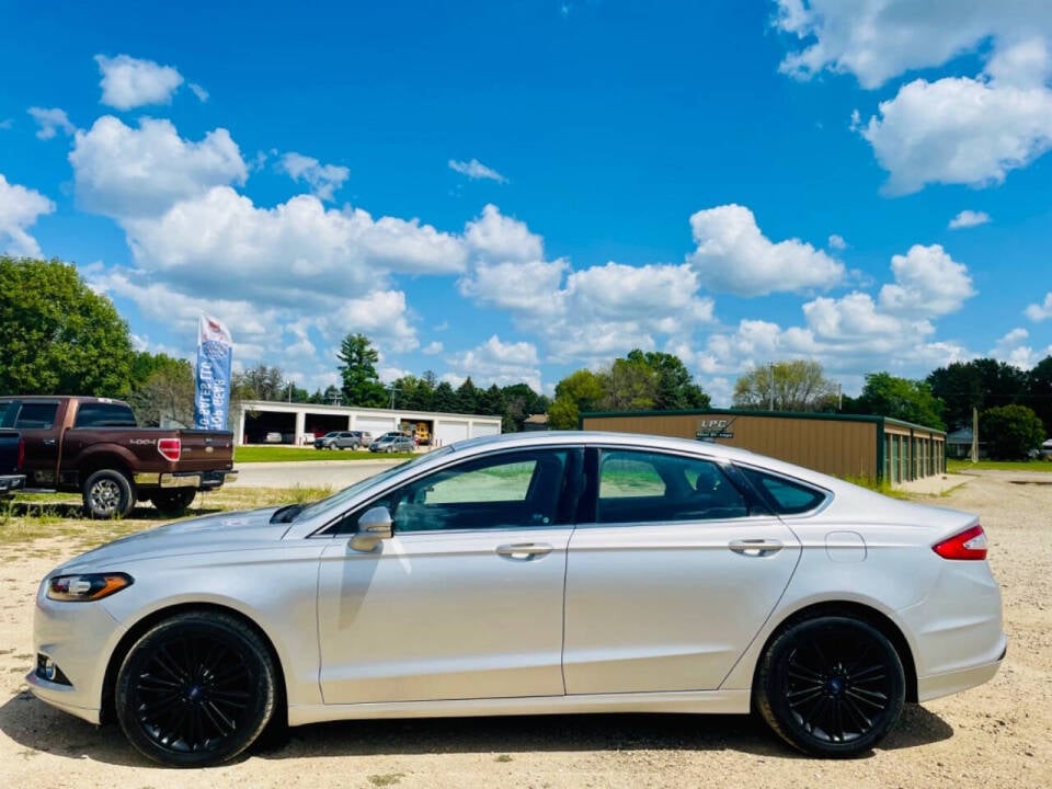 2016 Ford Fusion for sale at Top Gear Auto Sales LLC in Le Roy, MN