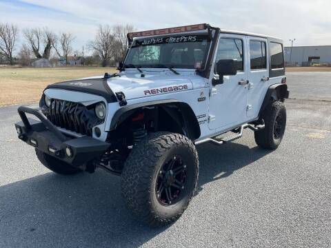 2014 Jeep Wrangler Unlimited for sale at Deans Automotive Group, Inc. in Princeton NC