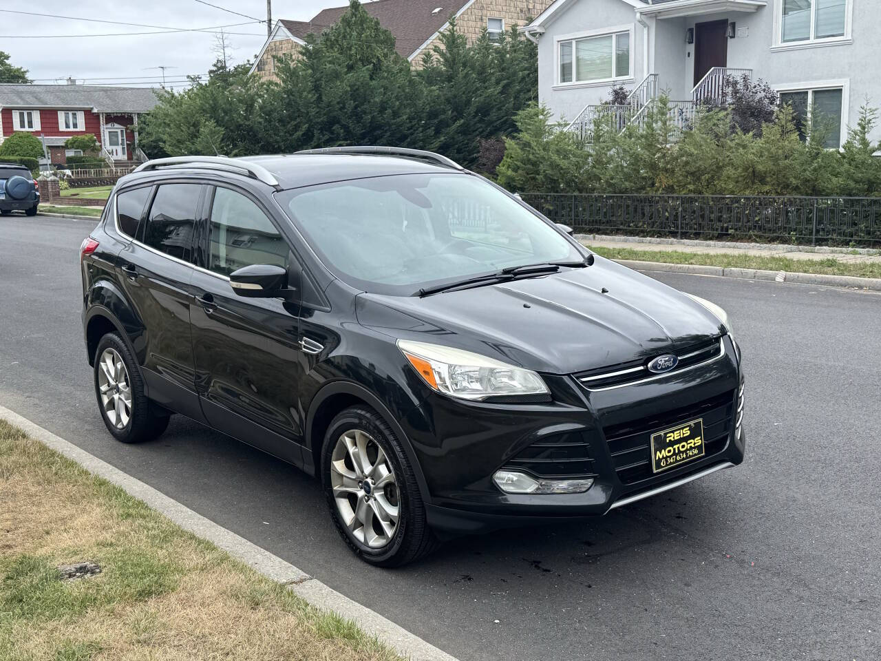 Black 2014 Ford Escape Titanium AWD Titanium 4dr SUV 2