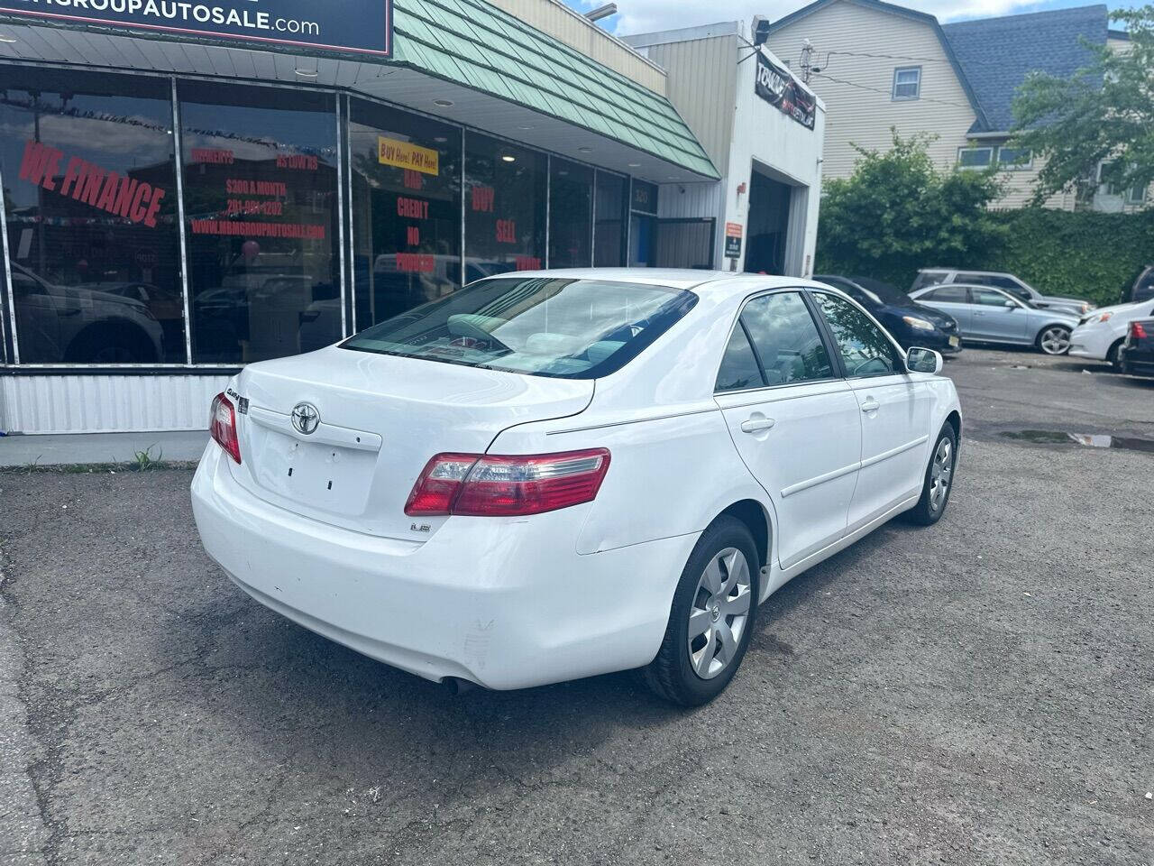 2009 Toyota Camry for sale at MBM Group LLC Auto Sales in Kearny, NJ