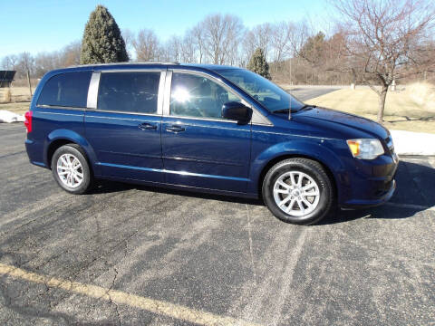 2014 Dodge Grand Caravan for sale at Crossroads Used Cars Inc. in Tremont IL