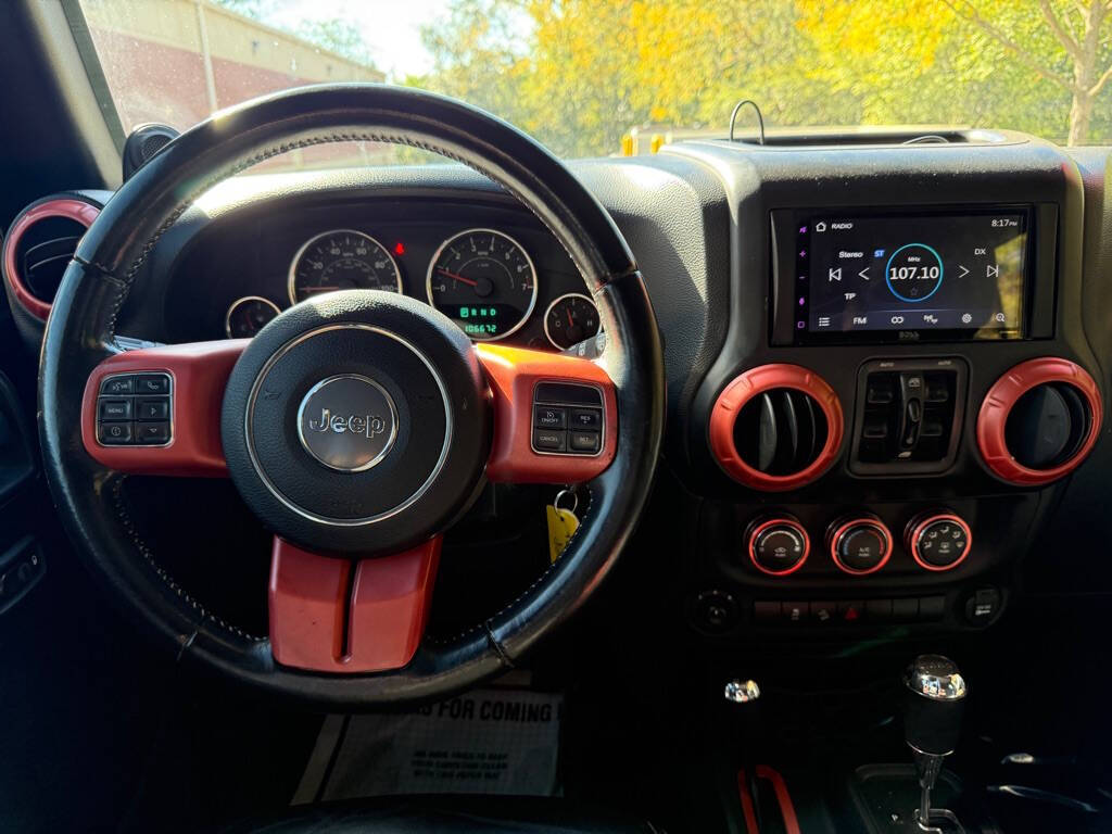 2014 Jeep Wrangler Unlimited for sale at Deals & Trades in Aurora, IL