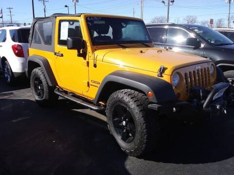 2012 Jeep Wrangler for sale at Village Auto Outlet in Milan IL