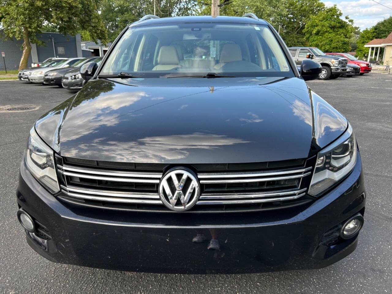 2013 Volkswagen Tiguan for sale at Auto Shop in Wyoming, MI