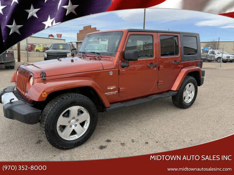 2009 Jeep Wrangler Unlimited for sale at MIDTOWN AUTO SALES INC in Greeley CO