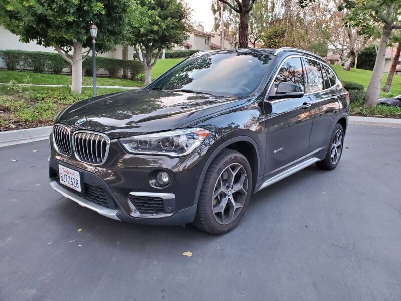 2017 BMW X1 for sale at E MOTORCARS in Fullerton CA