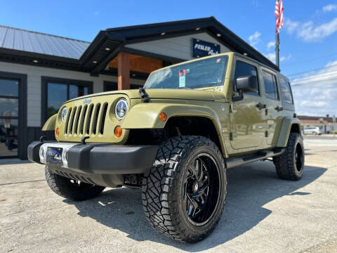 2013 Jeep Wrangler Unlimited for sale at Fesler Auto in Pendleton IN