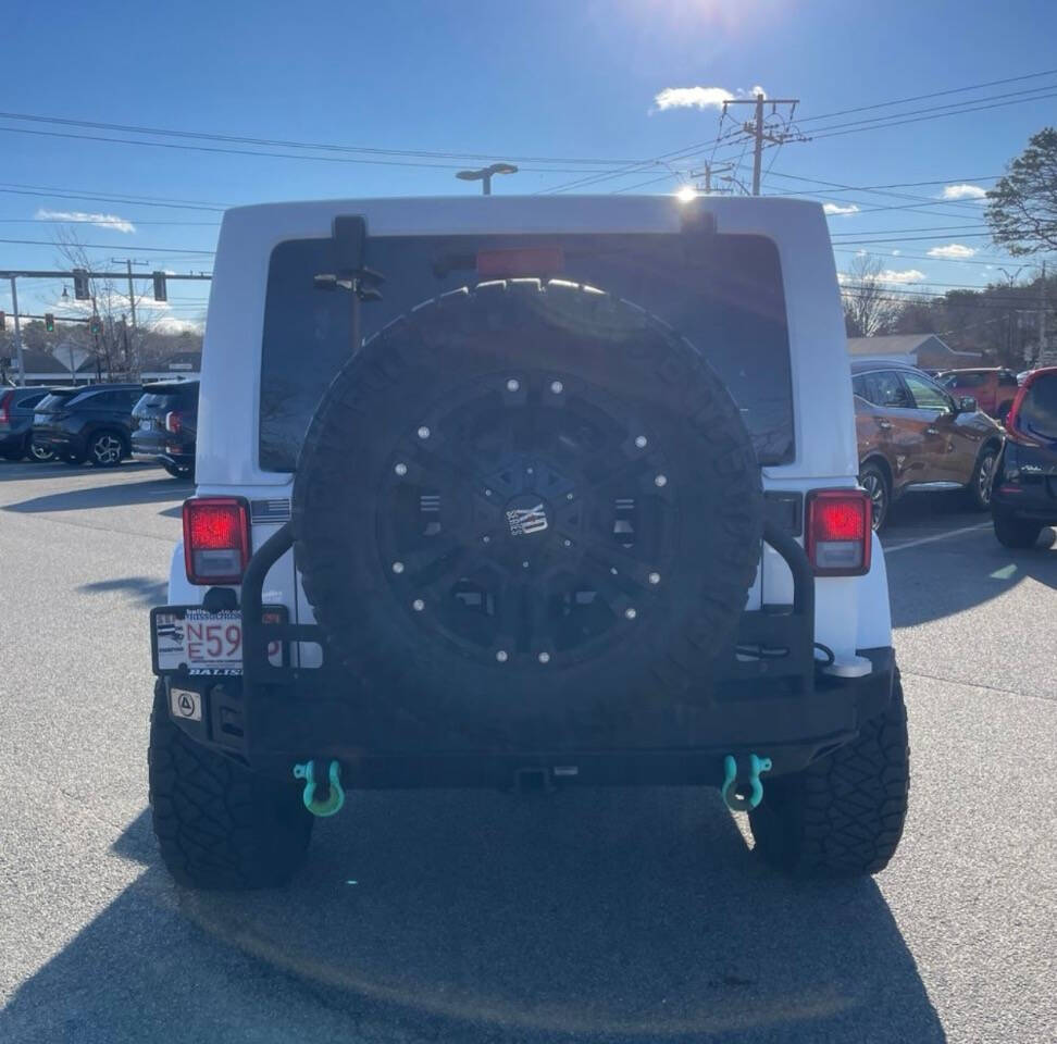 2015 Jeep Wrangler Unlimited for sale at JM4 Auto in Webster, NY