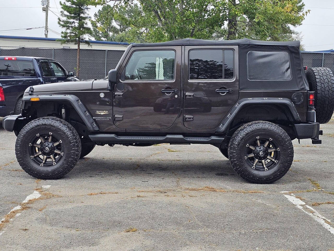 2013 Jeep Wrangler Unlimited for sale at 123 Autos in Snellville, GA