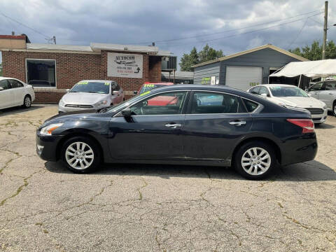 2013 Nissan Altima for sale at Autocom, LLC in Clayton NC