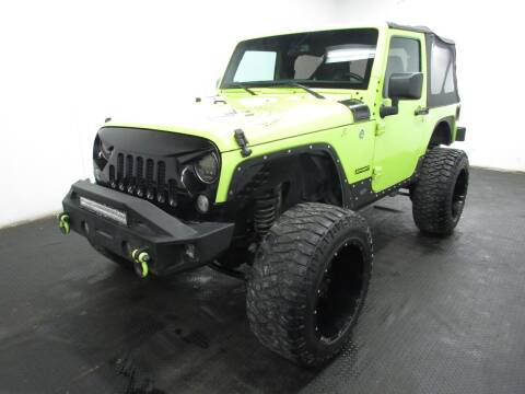 2016 Jeep Wrangler for sale at Automotive Connection in Fairfield OH