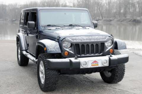 2013 Jeep Wrangler Unlimited for sale at Auto House Superstore in Terre Haute IN