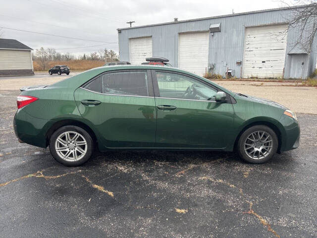 2015 Toyota Corolla for sale at DECKER AUTO SALES in Bay City, MI