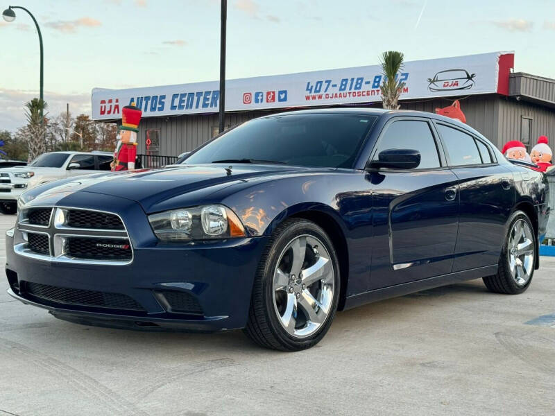 2014 Dodge Charger for sale at DJA Autos Center in Orlando FL