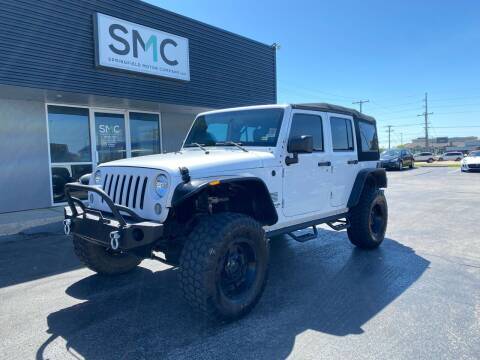 2014 Jeep Wrangler Unlimited for sale at Springfield Motor Company in Springfield MO