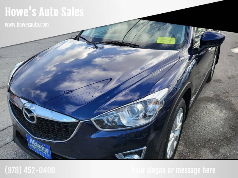 2014 Mazda CX-5 for sale at Howe's Auto Sales in Lowell MA