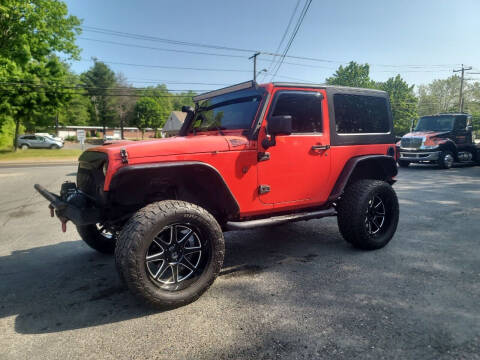2013 Jeep Wrangler for sale at Hometown Automotive Service & Sales in Holliston MA
