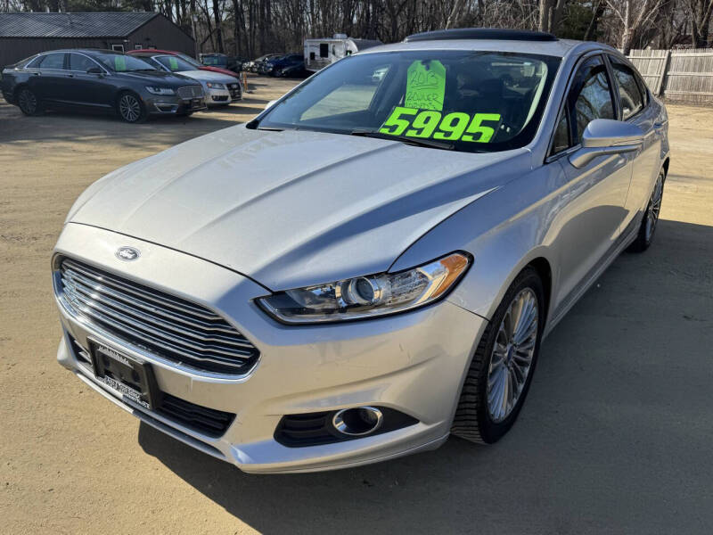 2013 Ford Fusion for sale at Northwoods Auto & Truck Sales in Machesney Park IL
