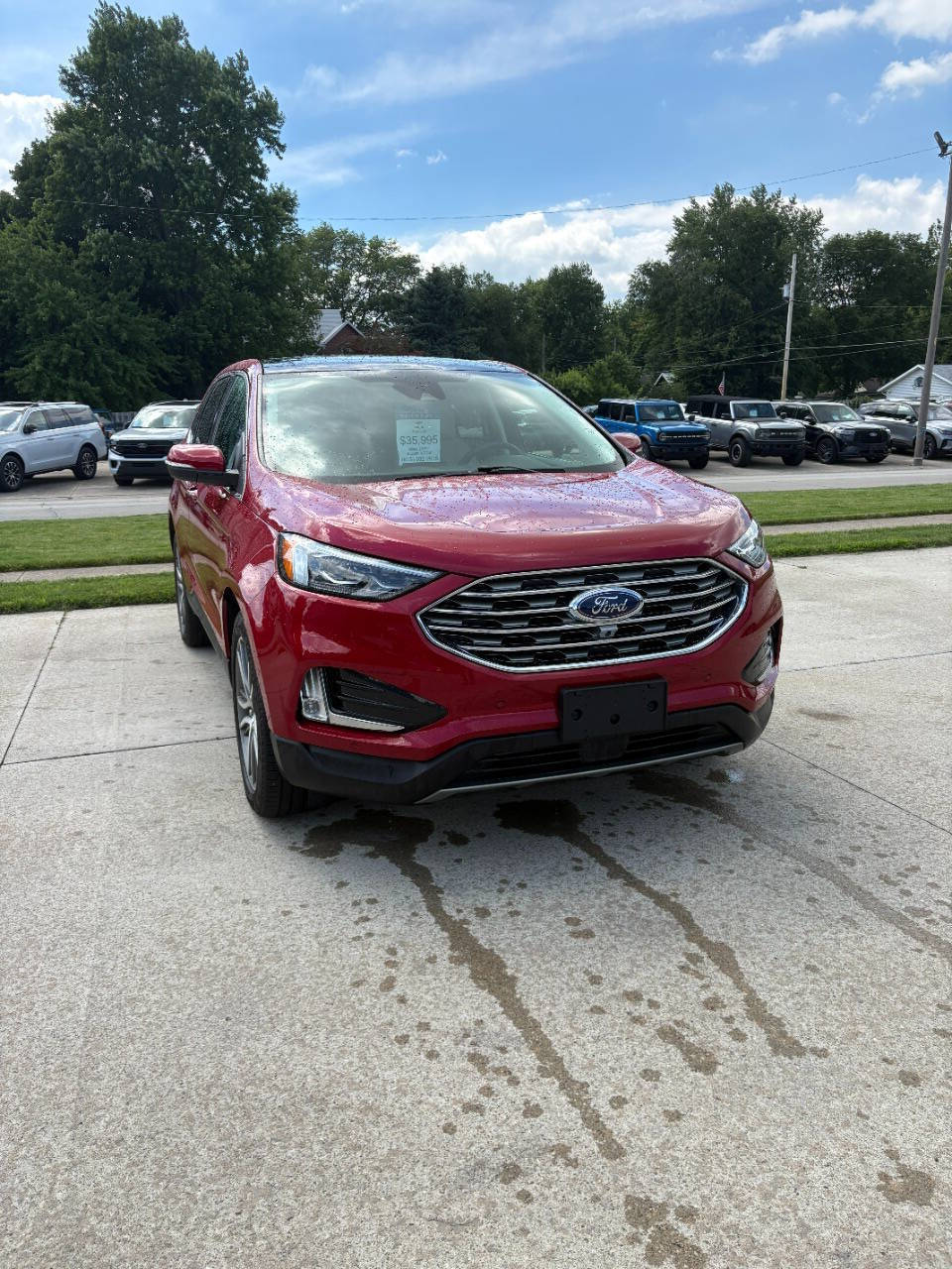 Rapid Red Metallic Tinted Clearcoat 2024 Ford Edge Titanium AWD Titanium 4dr SUV 1