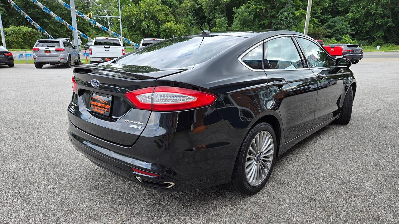 2014 Ford Fusion for sale at North Ridge Auto Center LLC in Madison, OH