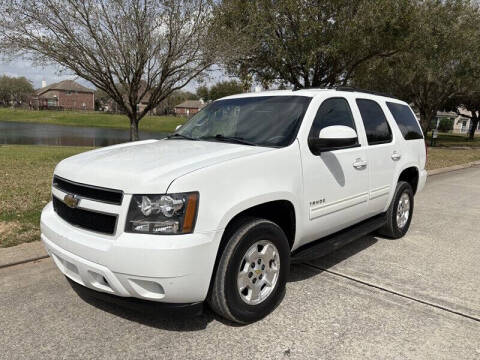 2011 Chevrolet Tahoe for sale at Essence Autos in Spring TX